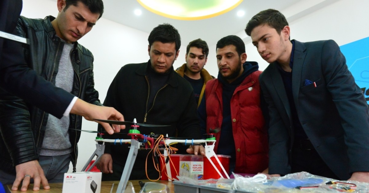 Students work on a drone at the technology center in u015eanlu0131urfa, April 3, 2019.
