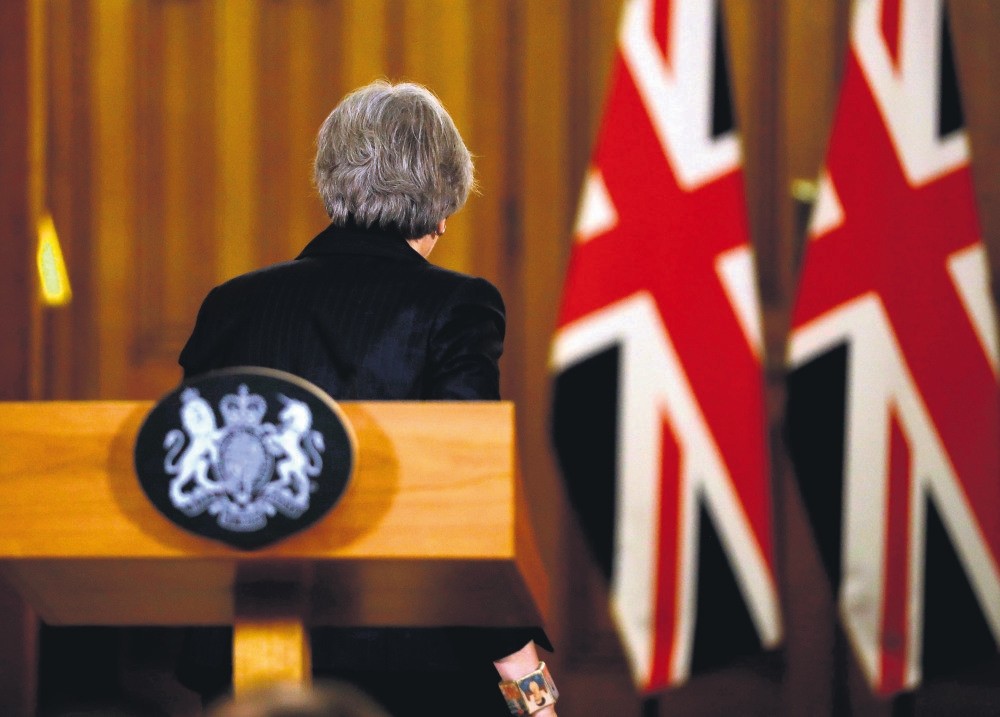 U.K. Prime Minister Theresa May leaves the podium after giving a press conference in central London about the Brexit process, Nov. 15.