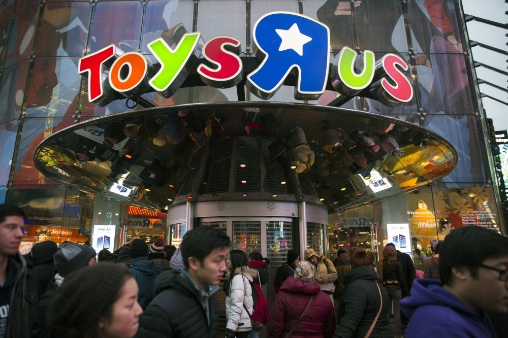 Shoppers line up outside to the Toys u2018R' Us store in Times Square for Black Friday deals in New York.