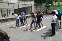 Turkish and Syrian children play together in Istanbul under the watch of their teachers. 