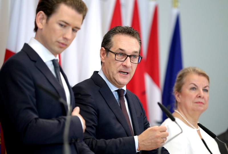Austrian Chancellor Sebastian Kurz, Vice Chancellor Heinz-Christian Strache and Social Minister Beate Hartinger-Klein attend a news conference during the second day of a cabinet meeting in Mauerbach, Austria. (Reuters Photo)