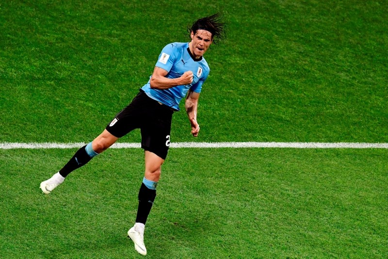 Uruguay's forward Edinson Cavani celebrates after scoring a second goal during the Russia 2018 World Cup round of 16 football match. (AFP Photo)