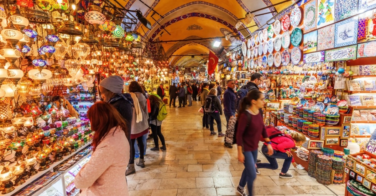 Tourists visit Istanbul's historic Grand Bazaar, one of the city's main tourist attractions.