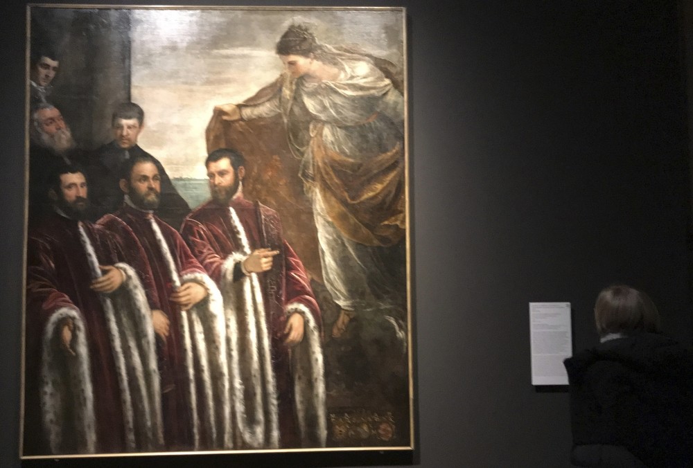 A work by Tintoretto, ,St. Justina with Three Treasurers and Their Secretaries, at the Ducal Palace in Venice.