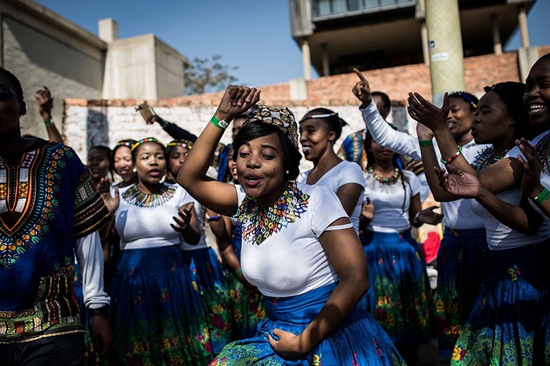 Members of The Maharishi Institute Choir perform at the global 'Walk Together' initiative event to celebrate Nelson Mandela's 100th Anniversary at Constitution Hill in Johannesburg.