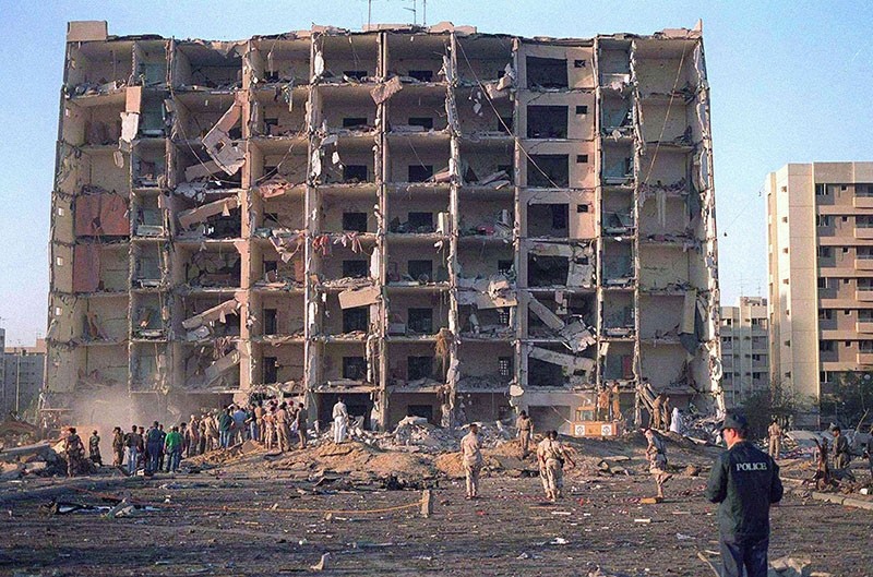 Investigators inspect the Khobar Towers military complex after an attack in Khobar, Saudi Arabia in June 1996. (Reuters Photo)