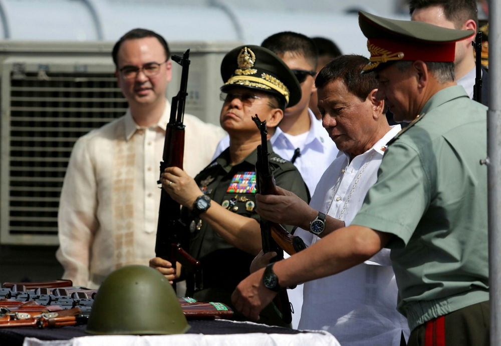 Philippine President Rodrigo Duterte inspects Kalashnikov rifles with Russian Defense Minister Sergei Shoigu, Oct. 25. 