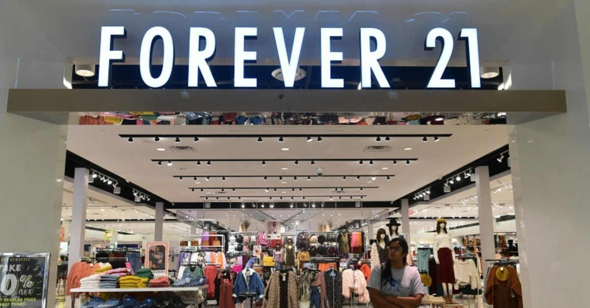 A shopper exits a Forever 21 store at a shopping mall in Montebello, California on September 30, 2019 a day after the fashion retailer filed for Chapter 11 bankruptcy protection. (AFP Photo)