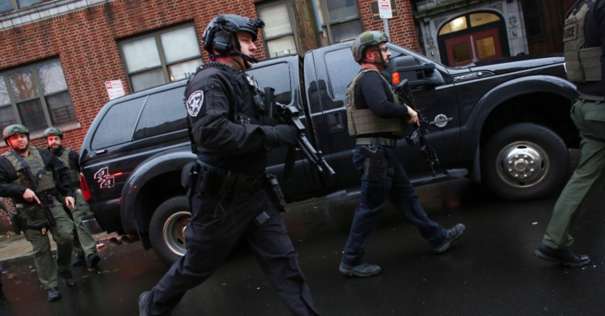 Police officers arrive to the scene where active shooting is happening in Jersey City on December 10, 2019. (AFP Photo)