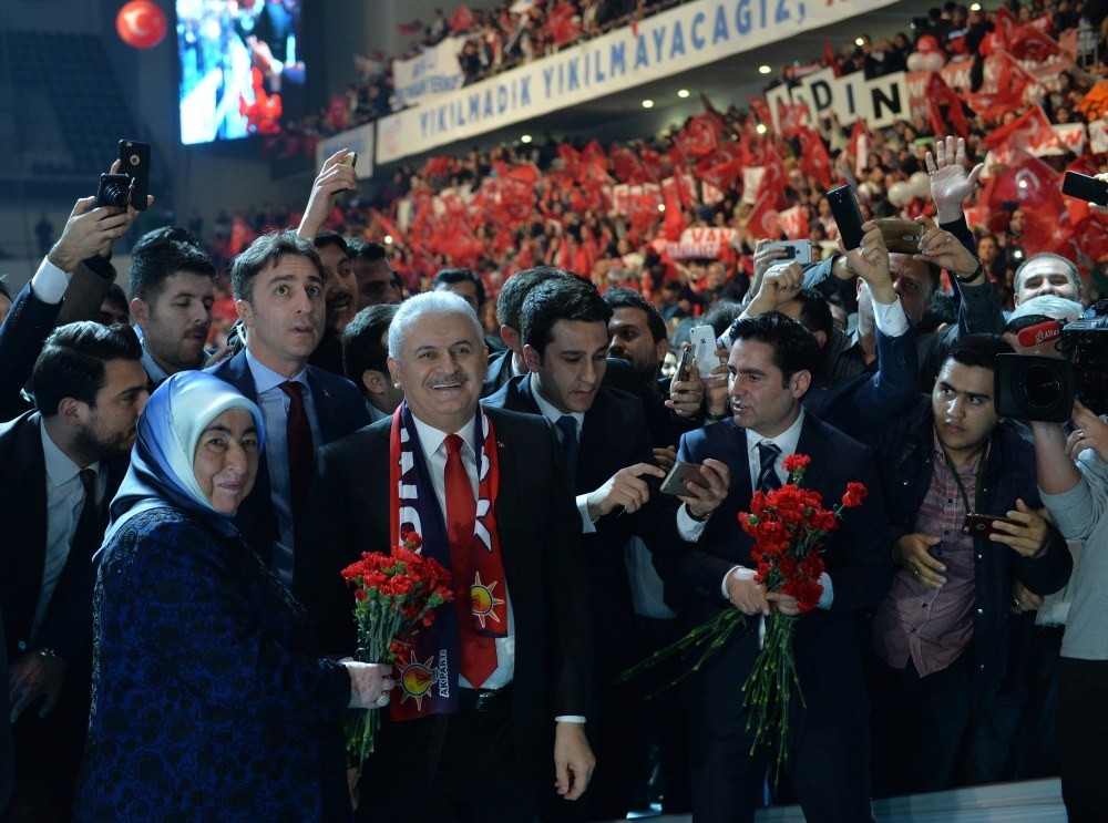 President Binali Yu0131ldu0131ru0131m (2nd-L) and his wife Semiha Yu0131ldu0131ru0131m (L), greeting supporters during a 'Yes vote' campaign meeting for the April referendum, Ankara, Feb. 25.