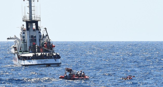 Desperate migrants leap off NGO ship, EU remains silent - Daily Sabah