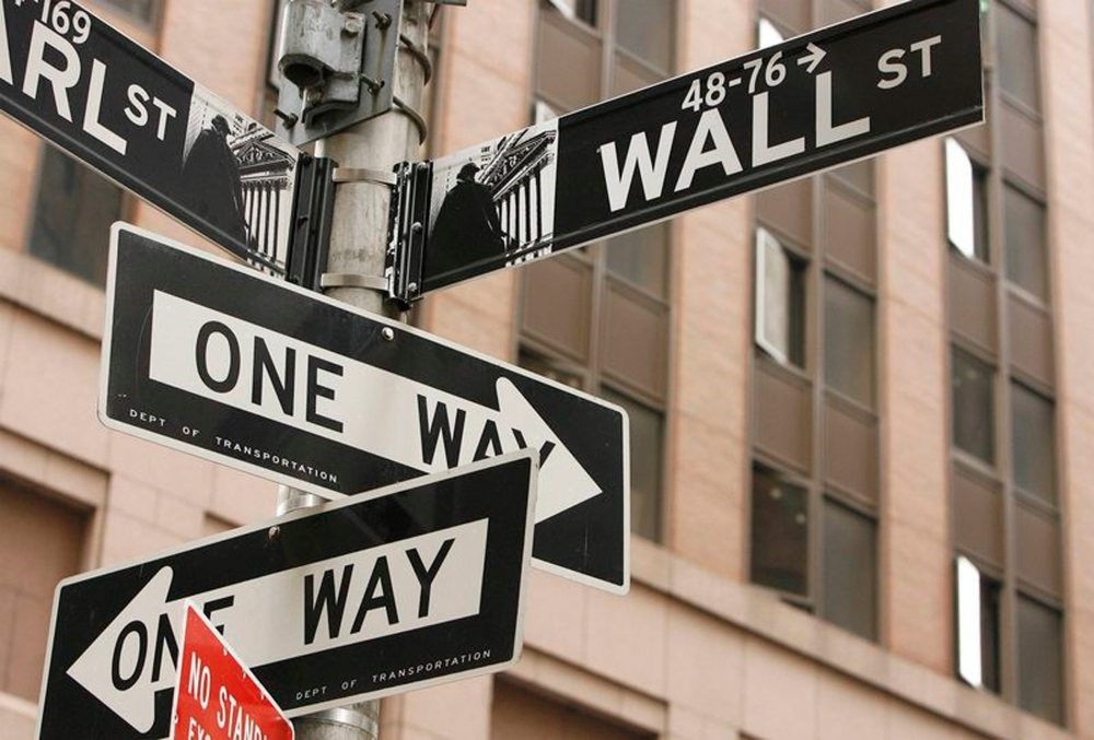 The famous One Way and Wall Street signs in southern Manhattan, New York.