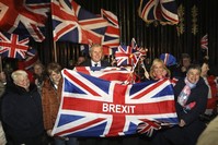 Brexit supporters celebrate during a rally outside Stormont, Belfast, Jan. 31, 2020. (AP Photo)