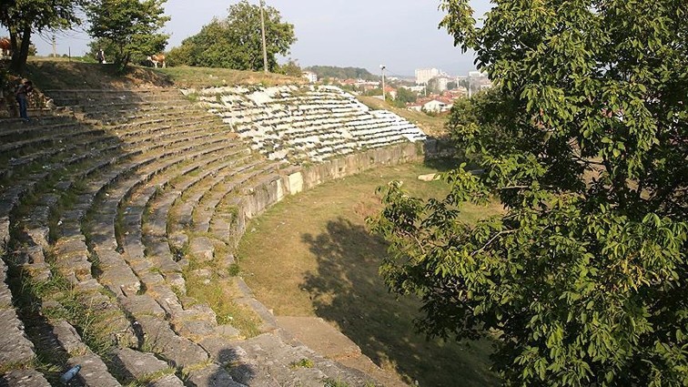 The ancient theater includes a semicircular seating area known as the ,40 Steps.,