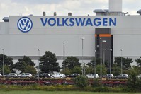 Trains carrying new cars stand in front of the Volkswagen (VW) factory in Zwickau, Germany, Aug. 22, 2016.