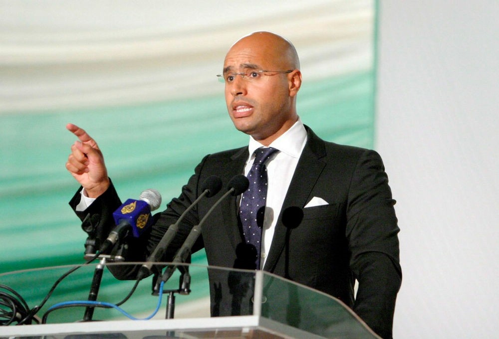 Saif al-Islam Gadhafi, son of Libyan then President Moammar Gadhafi speaks during a gathering in Tripoli before the NATO intervention, July 24, 2008.