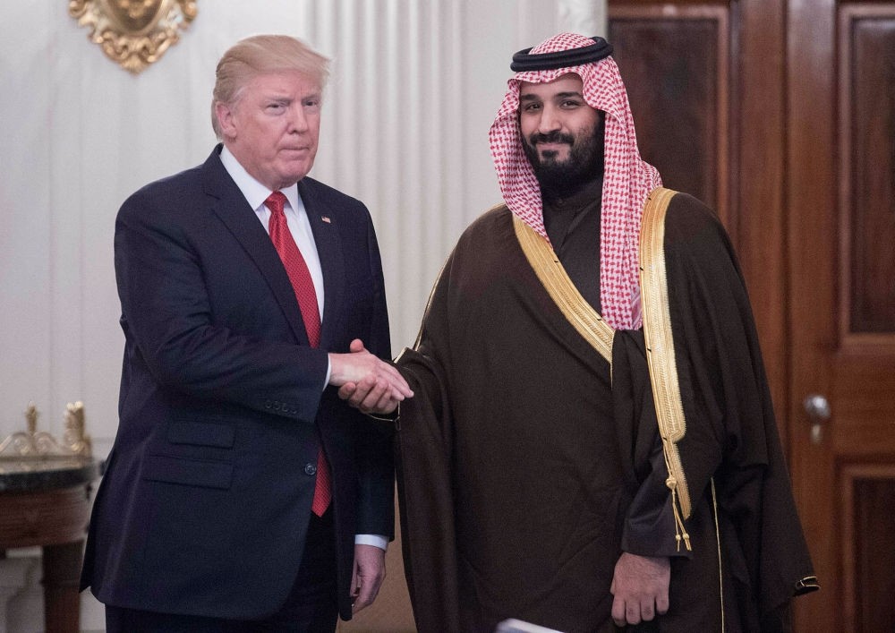 U.S. President Donald Trump and Saudi Deputy Crown Prince Mohammad bin Salman shake hands at the White House, March 14, 2017.
