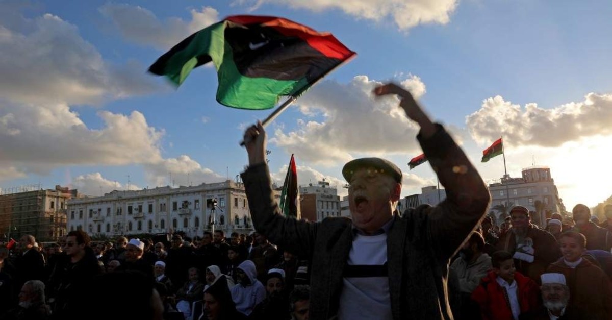 Libyan protesters shout slogans during a demonstration to demand an end to Khalifa Haftar's offensive against Tripoli, in Martyrs' Square in central Tripoli, Libya, Dec. 27, 2019. REUTERS