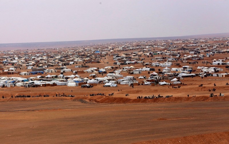 This file picture taken Tuesday, Feb. 14, 2017, shows an overview of the informal Rukban camp, between the Jordan and Syria borders. (AP Photo)