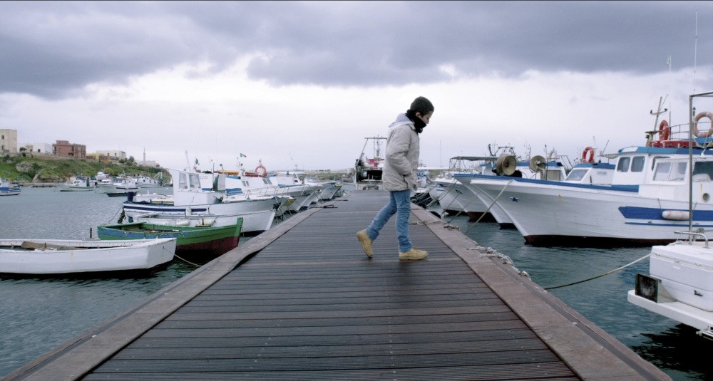 u201cFuocoammareu201d (Fire at Sea) depicts the Italian island of Lampedusa as a landing ground for African and Middle Eastern refugees hoping to commense a new life. 