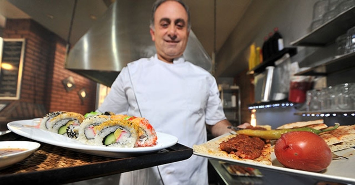 Turgay Kahraman offers sushi and kebab in his restaurant.