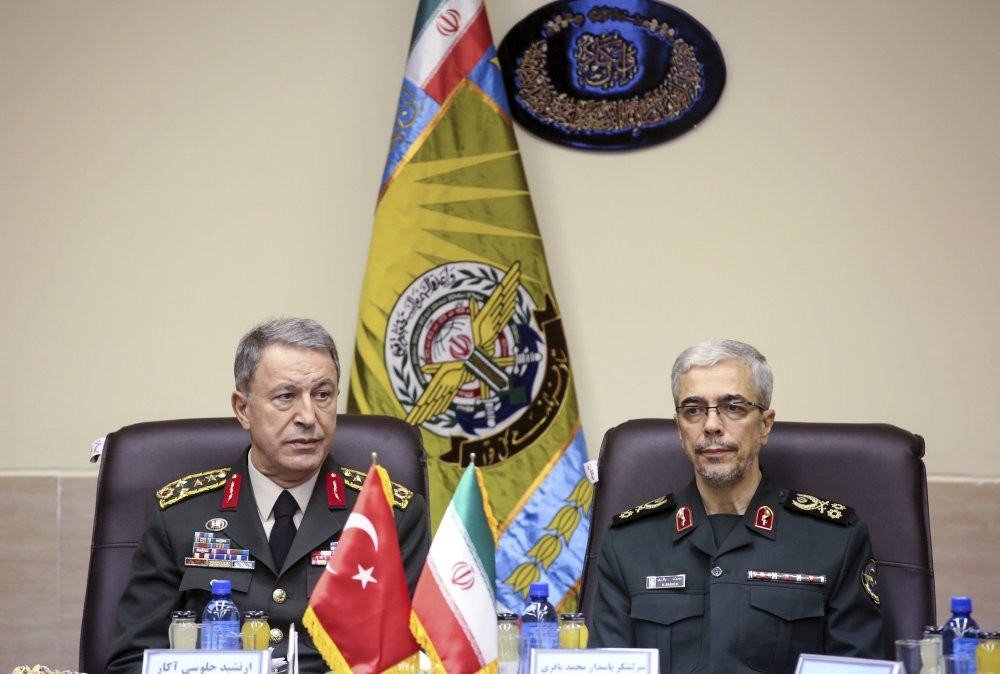 Turkey's Chief of General Staff Gen. Hulusi Akar (left) and Iran's Chief of Staff Lt. Gen. Mohammad Hossein Bahgeri at a meeting in Tehran last month.