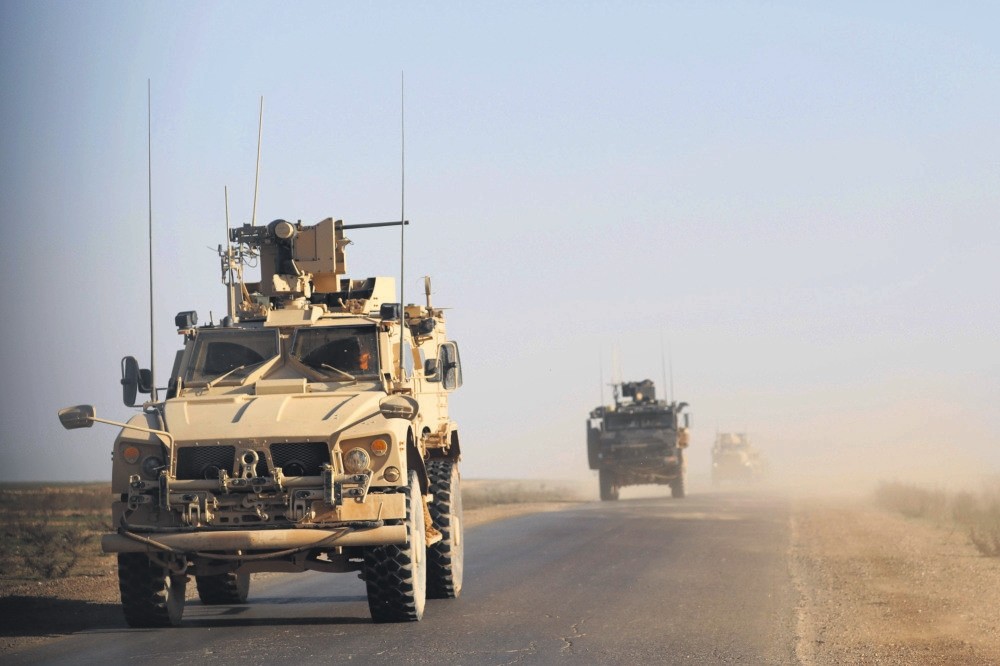 U.S. armored vehicles patrolling in the countryside of the eastern Syrian Deir el-Zour province, Jan. 31, 2019.