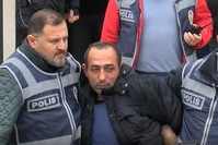 The defendant Arduu00e7 was brought to the courtroom under heavy security measures. (DHA Photo)