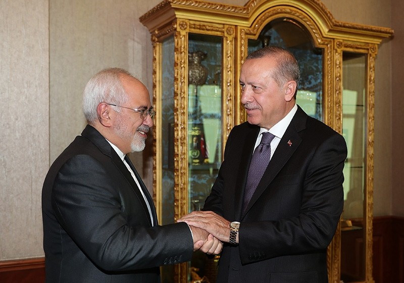 President Recep Tayyip Erdou011fan (R) welcomes Iranian Foreign Minister Javad Zarif to the Justice and Development Party (AK Party) headquarters in Ankara on Aug. 29, 2018. (IHA Photo)