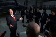 U.S. Vice President Mike Pence speaks to reporters in a hangar at Bagram Air Base in Afghanistan on Thursday, Dec. 21, 2017. (Pool via AP)