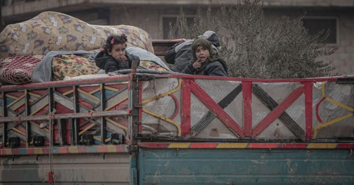 Hundreds of thousands of civilians fled the attacks by the Assad regime and Russia following a surge in violence, Feb.13, 2020. (AA Photo)