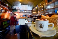 In this April 30, 2013 file photo, the interior of the original Costa Coffee shop in London's Vauxhall Bridge Road, which was opened in 1978 by brothers Sergio and Bruno Costa and is now closed. (AP Photo)