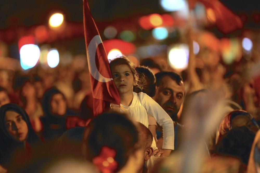 A child carrying a Turkish flag last year during the u201cDemocracy Watchesu201d that continued for weeks after the failed coup attempt.