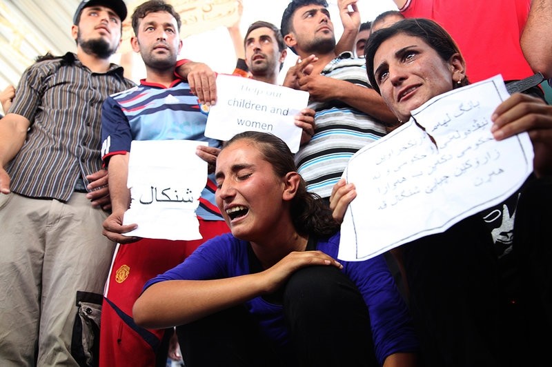 Displaced demonstrators from the Yezidi minority demonstrate outside the United Nations offices in Irbil, Iraq, on Aug. 4, 2014 in support of those held captive by Daesh. (Reuters Photo)