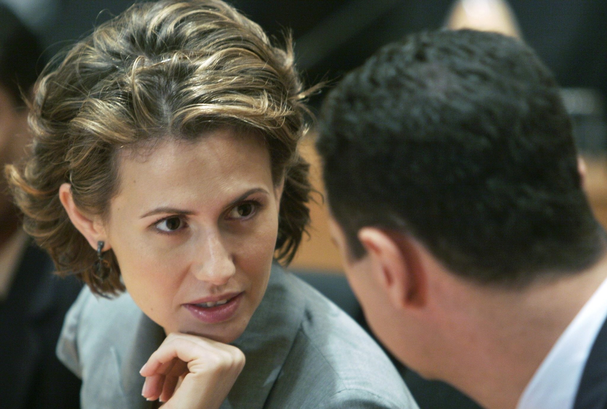 In this 2008 file photo, Bashar Assad, right, listens to his wife Asma Assad during their visit to the campus of Infosys Technologies Ltd in Bangalore, India. (AP Photo)