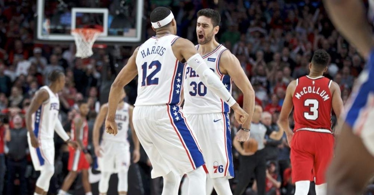 Philadelphia 76ers guard Furkan Korkmaz (R) and Philadelphia 76ers forward Tobias Harris react after Korkmaz's game-winning 3-pointer against Portland Trail Blazers in the NBA, Portland, Nov. 2, 2019. The 76ers won the game 129-128. (AP Photo)