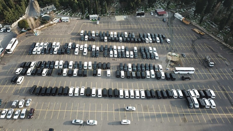 Van used by Uber drivers sit in an Istanbul lot (DHA Photo)