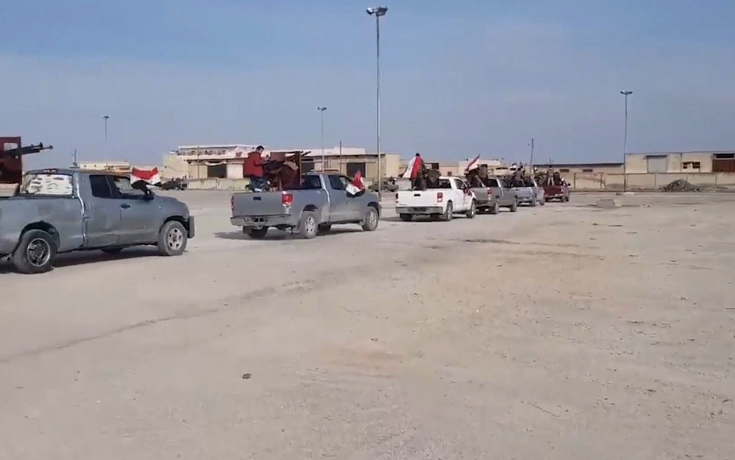 A convoy of Assad regime forces entering Afrin in northern Syria where Turkish military lauched an operation. (Source: Syrian State TV)
