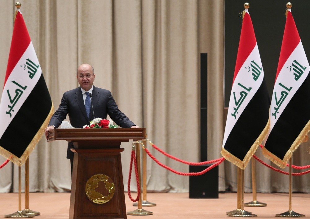 The newly elected Iraqi President Barham Salih delivers a speech at the parliament in Baghdad, Oct. 2.