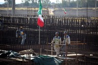 A picture taken on November 10, 2019, shows workers on a construction site in Iran's Bushehr nuclear power plant. (AFP Photo)