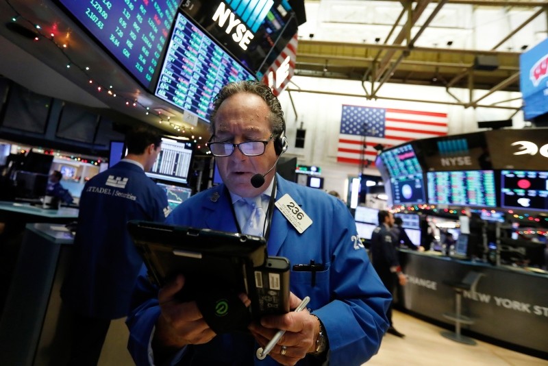 Trader Steven Kaplan works on the floor of the New York Stock Exchange, Wednesday, Dec. 26, 2018. (AP Photo)