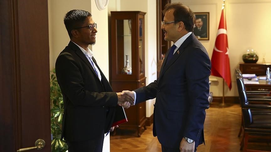 Turkish Deputy PM Hakan u00c7avuu015fou011flu (R) met with Dr. Hla Kyaw, head of European Rohingya Council (L)