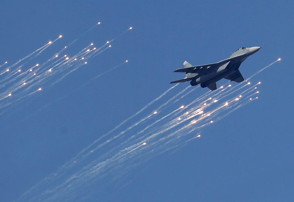 A Serbian Army MiG-29 jet fighter performs during ceremony in Batajnica, military airport near Belgrade, Serbia. (AP Photo)