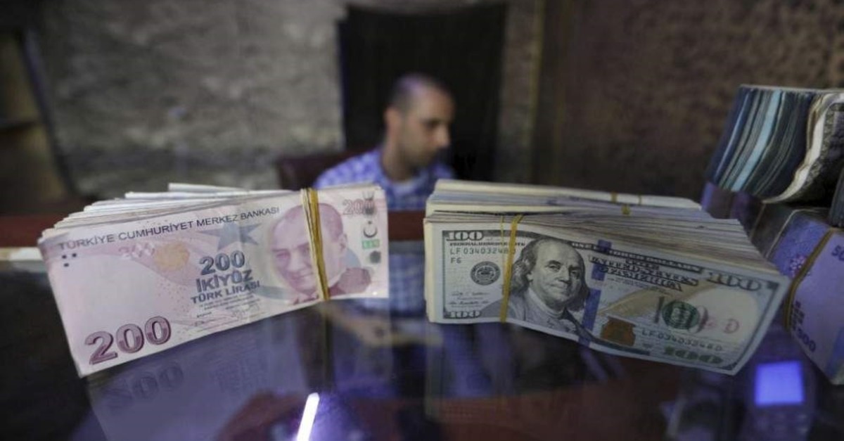 Banknotes of U.S. dollars and Turkish lira in a currency exchange shop in Azaz, Syria, Aug. 18, 2018. (Reuters Photo)