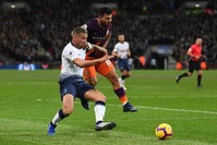 Toby Alderweireld of Tottenham and Sergio Aguero of Manchester City fight for the ball in a Premier League game, Oct. 29, 2018.