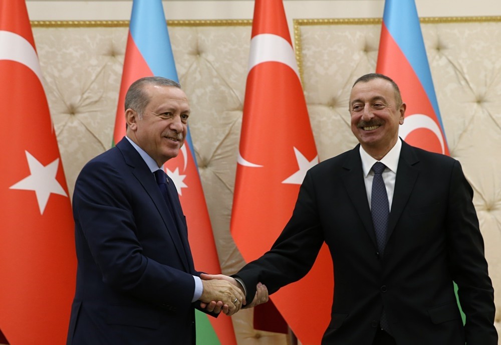 President Erdou011fan and Azerbaijani President Aliyev shake hands at a joint press conference after the 6th Turkey-Azerbaijan High-Level Strategic Cooperation Council Meeting yesterday in Baku.