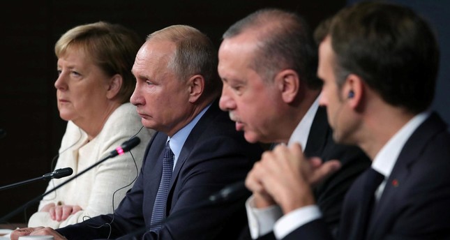 German Chancellor Merkel, Russia's Putin, Presidents Erdoğan and Macron during a press conference Reuters File Photo