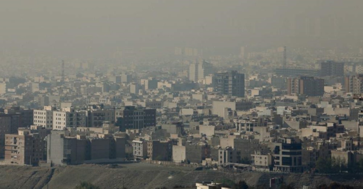 A general view taken from Western Tehran shows a blanket of brown-white smog covering the city as heavy pollution hit the Iranian capital on November 13, 2019. (AFP Photo)