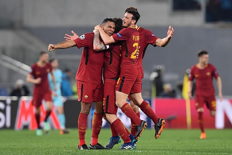 Roma's players celebrate their win at the end of the UEFA Champions League quarter final second leg match between AS Roma and FC Barcelona at Olimpico stadium in Rome, Italy, 10 April 2018. (EPA Photo)