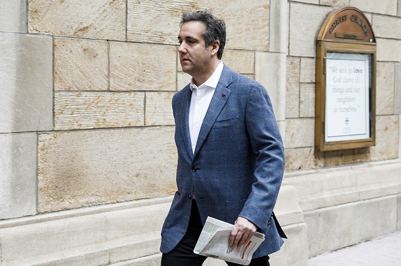 Attorney Michael Cohen, U.S. President Donald J. Trump's long-time personal attorney, walks from his hotel to his apartment in New York, April 12, 2018. (AP Photo)